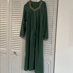 Long dress with sections on the sides.